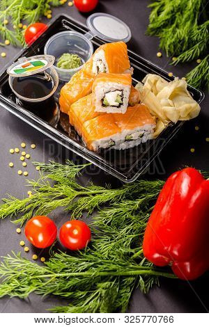 Russia Saint Petersburg Greenbox 01102019 Sushi Rolls Philadelphia Lies On A Square Stone Slate, Wit