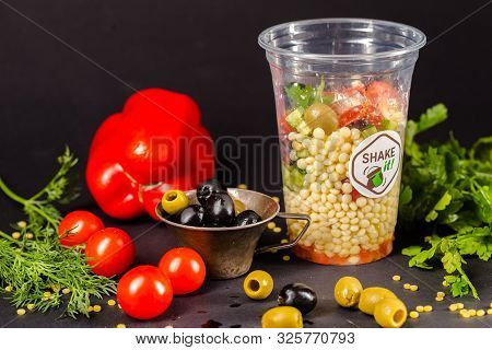 Russia St. Petersburg Greenbox 01102019 Italian Salad With Olives, Cereals, In A Plastic Container, 