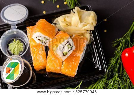 Russia Saint Petersburg Greenbox 01102019 Sushi Rolls Philadelphia Lies On A Square Stone Slate, Wit