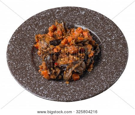 Stewed Zucchini With Tomatoes And Peppers On A Brown With Murble Crumb Plate Isolated On A White Bac