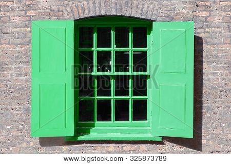 Window In Old English Warehouse Building Painted Neo Mint Shade Of Green
