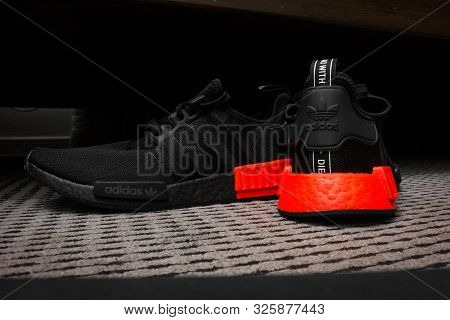 Adidas Nmd Sneakers With Ultra Boost Technology In All Black With Red Accent - Sports Shoes 
- Dubai