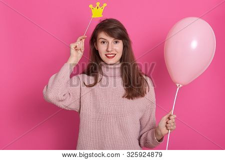 Beautiful Young Woman With Air Balloon And Crown, Adorablae Girl Wearing Rosy Sweter, Using Photobut