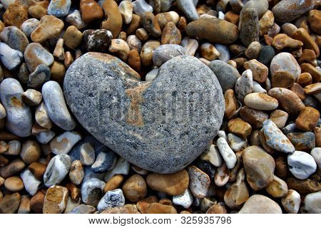 Heart Shape Stone At A Pebble Beach