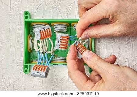 Electrical Service, Electrical Work, Electrician Uses Mounting Terminals With A Push Lever To Connec