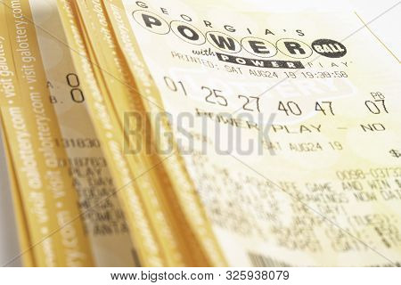 A Stack Of Powerball Lottery Tickets