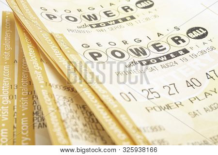 A Stack Of Powerball Lottery Tickets