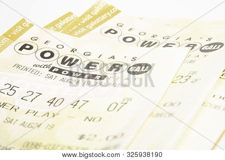 A Stack Of Powerball Lottery Tickets