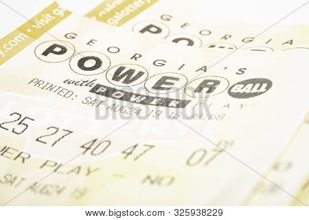 A Stack Of Powerball Lottery Tickets