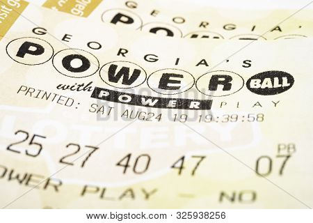 A Stack Of Powerball Lottery Tickets