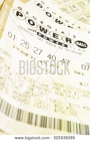 A Stack Of Powerball Lottery Tickets