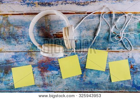 Yellow Sticky Empty Square Notes Reminder With White Headphones On Music Concept, In The Blue Old Wo