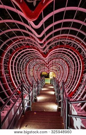 A Stairway Leading Through A Tunnel Of Hearts In Jewangsan Park In Chinhae, South Korea