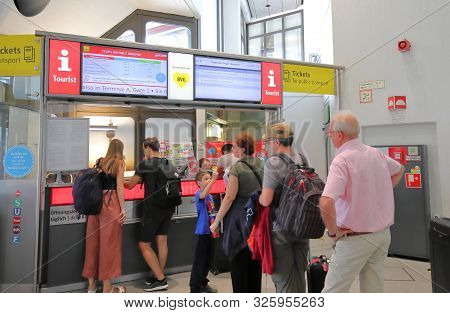 Berlin Germany - June 12, 2019: Unidentified People Queue At Berlin Tegel Airport Tourist Informatio