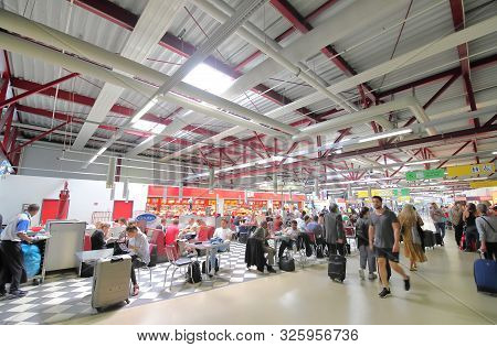 Berlin Germany - June 12, 2019: Unidentified People Travel At Tegel Airport Berlin Germany