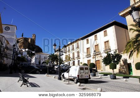 Montefrio, Spain - November 11, 2009 - Main Along With Main Street With The Castle On The Hill To Th