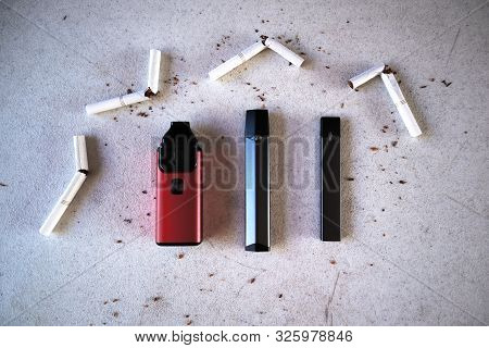 Different Vape Devices Electronic Cigarettes As Smoking Alternatives With Broken Cigarettes And Scat