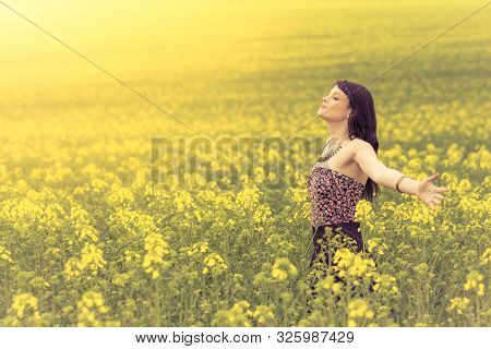 Happy beautiful woman in free summer love of youth wellbeing. Attractive young beauty girl enjoying 