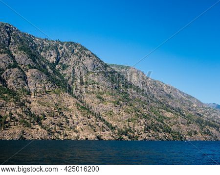 Scenic Landscape Of Lake Chelan On A Sunny Day - Washington State, Usa