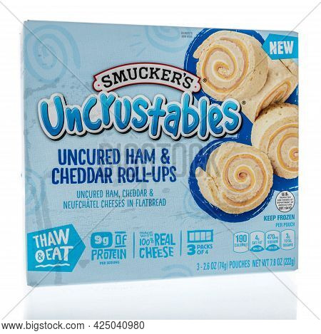 Winneconne, Wi - 27 June 2021:  A Package Of Smuckers Uncrustables Uncured Ham And Cheddar Roll Ups 