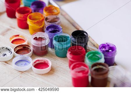 Artists Desk: Paints, Brushes, Paper And Gouache