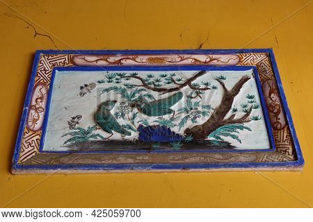Hoi An, Vietnam, May 23, 2021: Detail Of The Relief Decoration Of The Van Thanh Mieu Cam Pho Temple 