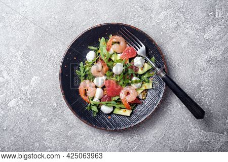 Healthy Salad With Fresh Arugula, Mozzarella Cheese, Tasty Shrimps, Grapefruit And Avocado