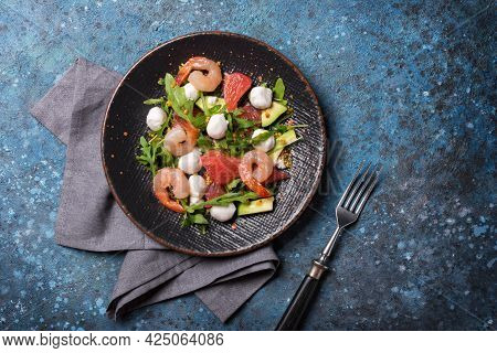 Healthy Salad With Fresh Arugula, Mozzarella Cheese, Tasty Shrimps, Grapefruit And Avocado