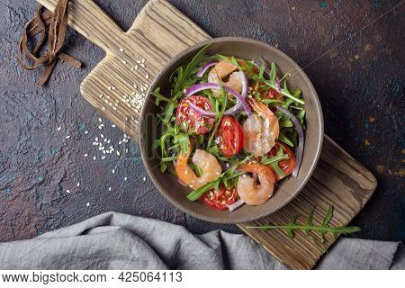 Healthy Salad With Fresh Arugula, Cherry Tomatoes, Tasty Shrimps And Onion
