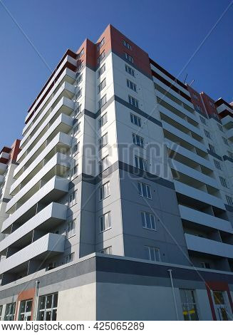 Facade Of New Modern Office Or Residential Building. Rising Price For Purchase, Sale And Rental Of R