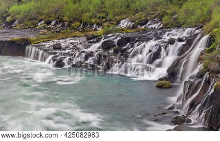 Scenic Hraunfossar water falls in Iceland during summer