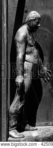 Germany, Luebeck, June 19, 2017, Bronze Statue With The Name, Revolving Door, In The Pedestrian Zone