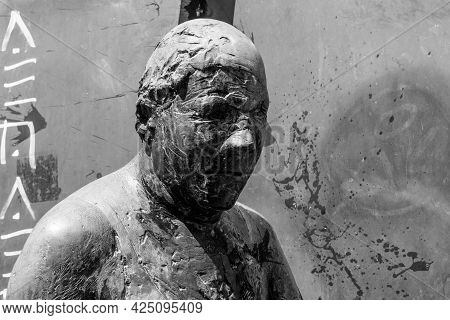Germany, Luebeck, June 19, 2017, Bronze Statue With The Name, Revolving Door, In The Pedestrian Zone