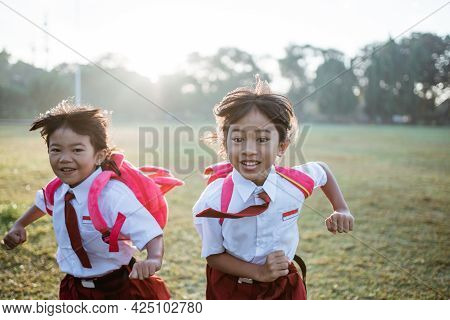 Little Girl Student Running Together While Going To Their School