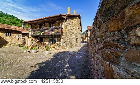 Old Mountain Village With Stone Houses And Cobbled Alleys. Barcena Mayor Santander.