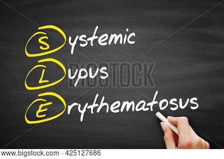 Sle - Systemic Lupus Erythematosus Acronym, Concept On Blackboard