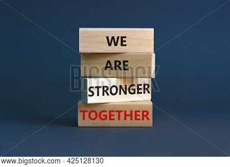 Stronger Together Symbol. Wooden Block With Words 'we Are Stronger Together'. Beautiful Grey Backgro