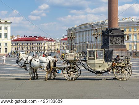 Saint Petersburg, Russia - June 2021: Horse Carriage On Palace Square