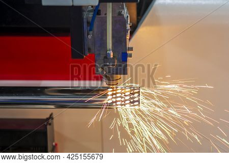 The Fiber Laser Cutting Machine Cutting The Stainless Steel Tube Control By Cnc Program. The Sheet M