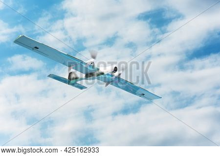 Unmanned Aerial Vehicle Flight Motion Blur Effect In The Cloudy Sky