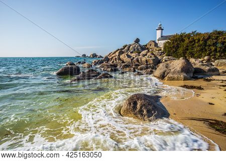 Pontusval lighthouse and the coast in Kerlouan, northern Brittany, France
