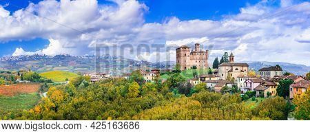 Medieval casstle and village Castello di Grinzane  . one of the most famous vine region of Italy  - Piedmont