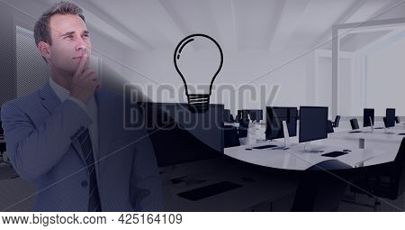 Composition of translucent black copy space over lightbulb and businessman thinking in office. business, energy, ideas, growth and light concept, digitally generated image.