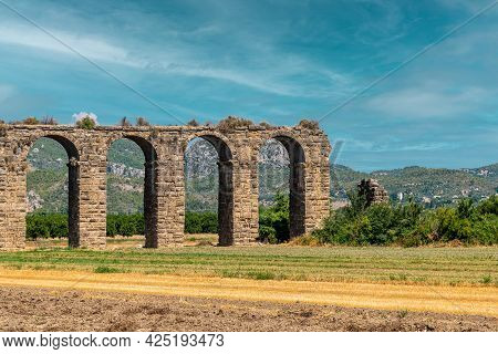 Aqueducts In The Ancient City Of Aspendos In Antalya, Turkey.