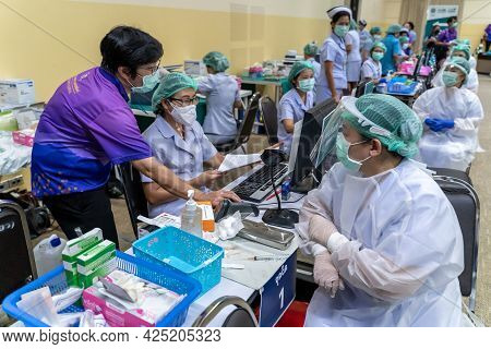 Chiang Mai, Thailand - 7 June 2021 - Thai Nurses G To Give People The Covid-19 Vaccines At Royal Flo