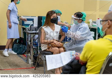 Chiang Mai, Thailand - 28 June 2021 - A Thai Woman Get Her Covid-19 Vaccine In Chiang Mai, Thailand