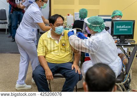 Chiang Mai, Thailand - 28 June 2021 - A Thai Man Get His Covid-19 Vaccine In Chiang Mai, Thailand