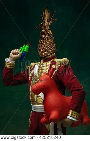 Pineapple. Model Like Medieval Royalty Person In Vintage Clothing. Concept Of Comparison Of Eras, Ar