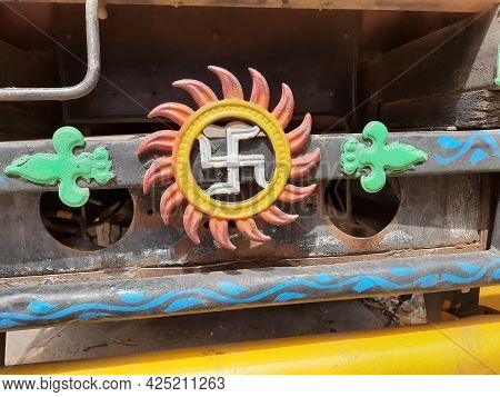 Beautiful Indian Traditional Ritual Symbol Swastik And Sun Metal Sign Back Of The Vehicles