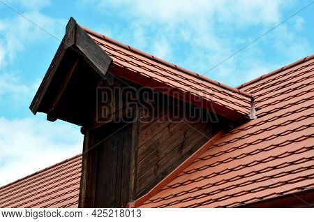 View Of The Roof Made Of Red Brick Burnt Tiles Of The Beaver Type Used In Central Europe On All Hist